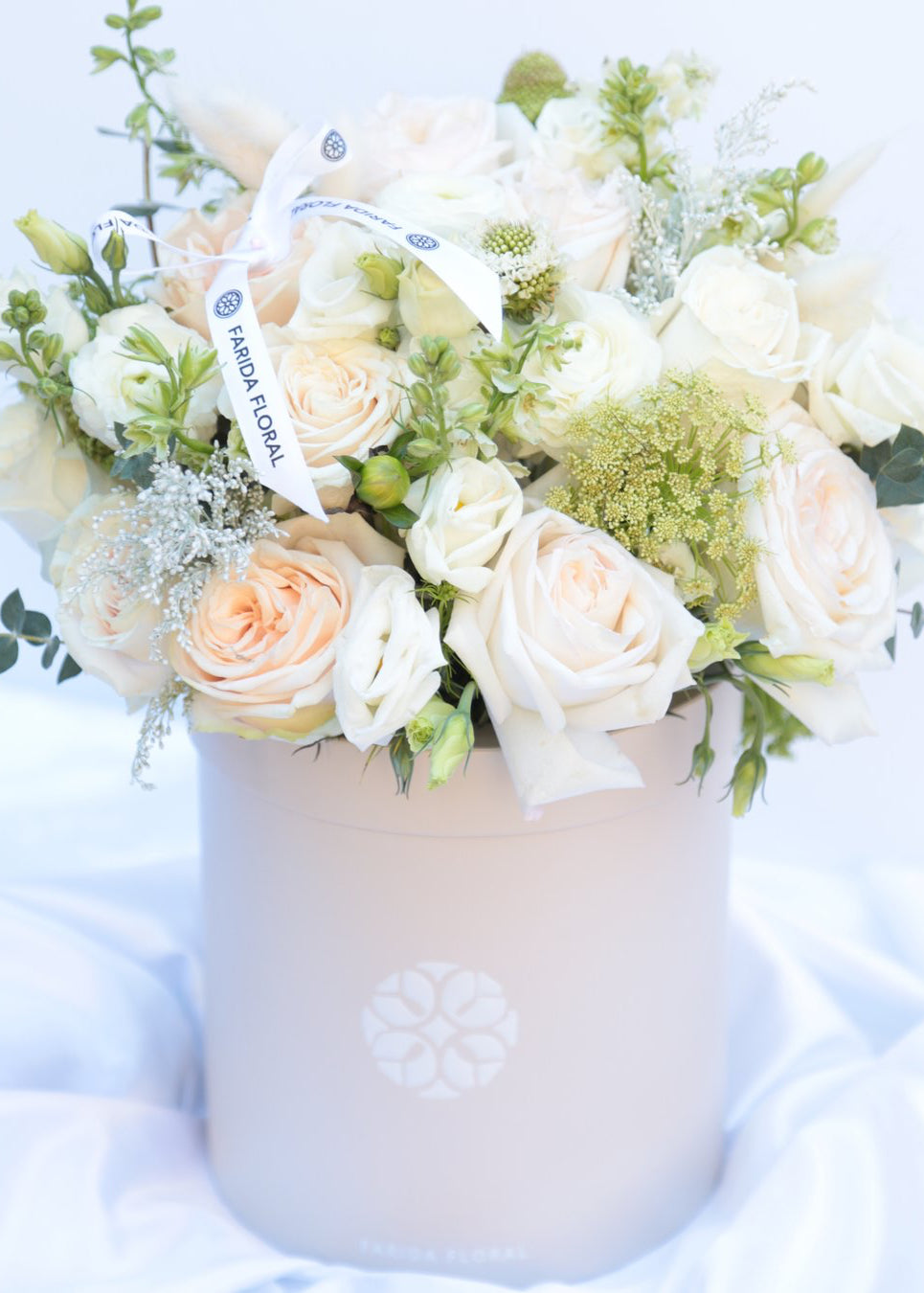 Peony season arrangement in soft pastels by Farida Floral, Fairfax VA