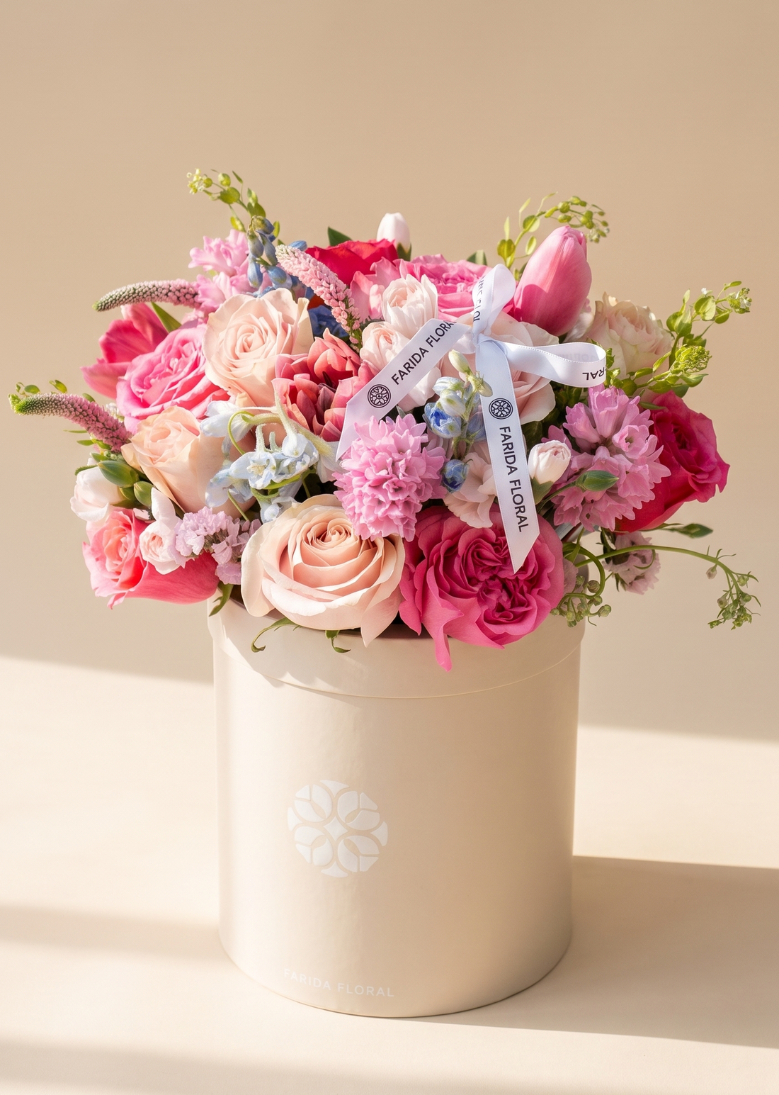 Vibrant pink garden birthday bouquet with roses and ranunculus by Farida Floral, Fairfax VA